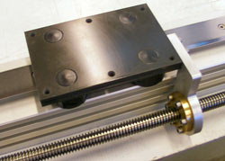 Stainless steel SL2 slide and bearings used in paper trimmer