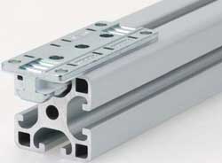 T-slot slider uses low-friction polymer plain bearing