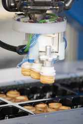 Robots lift pastry sales