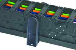 Low-cost roller energy chain and guiding trough from igus