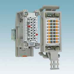 DIN rail mounting frames for pre-assembled contact inserts