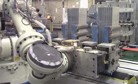 Six-station robotic machine tending boosts productivity