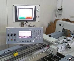 Integrated PLC and HMI upgrade book-binding machinery