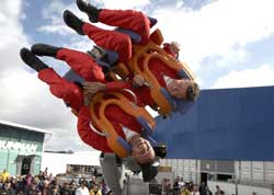 Red Arrows pilots take a trip on the Robocoaster