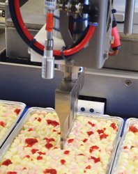Robot keeps Newtech at the cutting edge of cake slicing