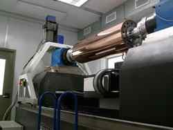 Rigid SBD actuator guides extraction system on diamond lathe