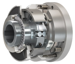 Housed torque limiter features automatic re-engagement