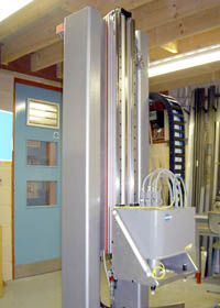 Rodless cylinder used to position and clamp